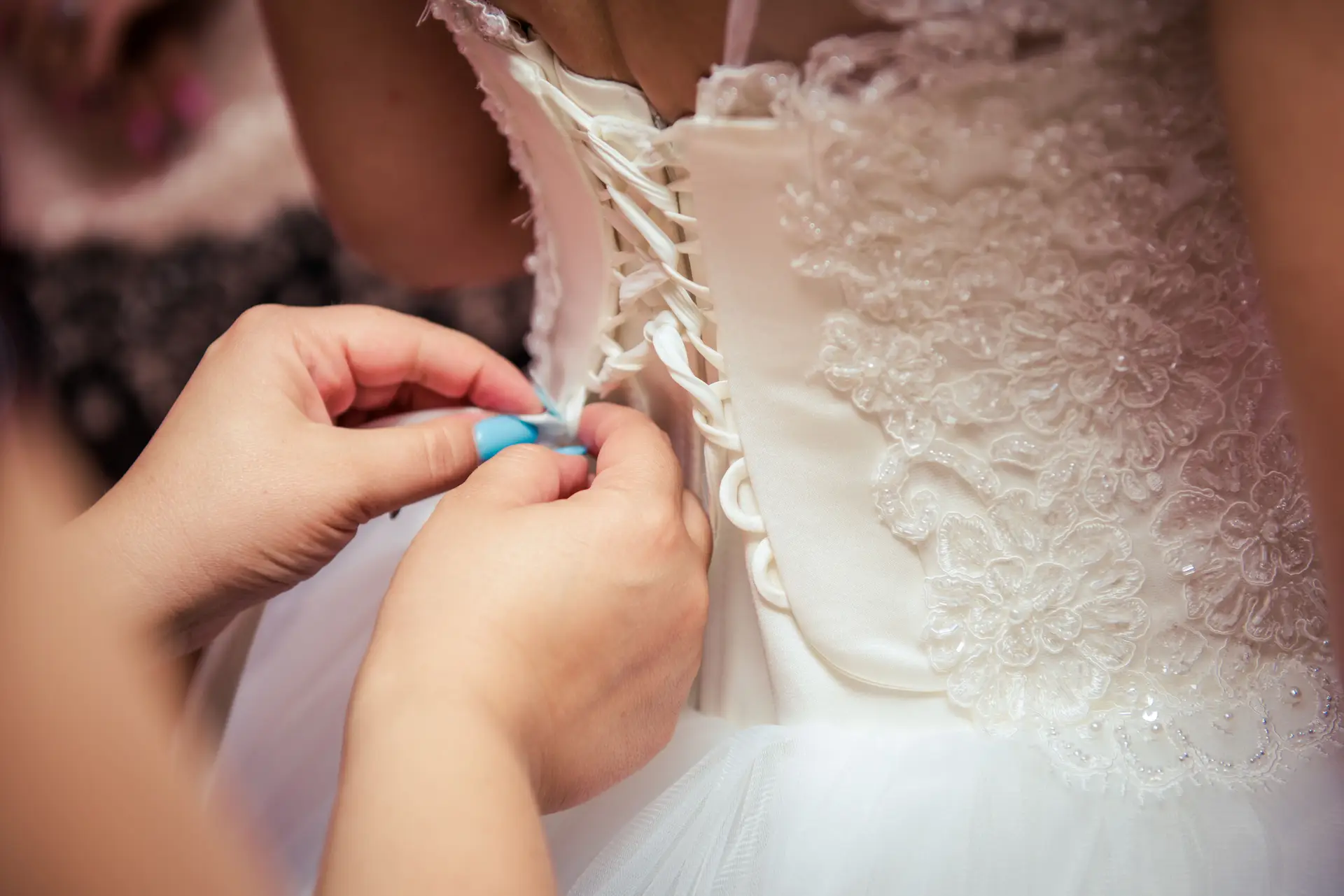 Happy bride during fitting